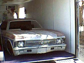 The Nitro Nova gets loaded into LeRoy Blackman's trailer for the trip out West. Photo by Craig Blanton